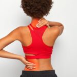 A girl is suffering from chronic back pain