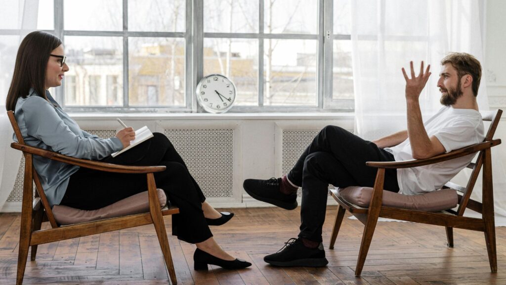 A couple discussing land registry issues