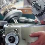A man fixing a new Taylor freezer gear box in the machinery