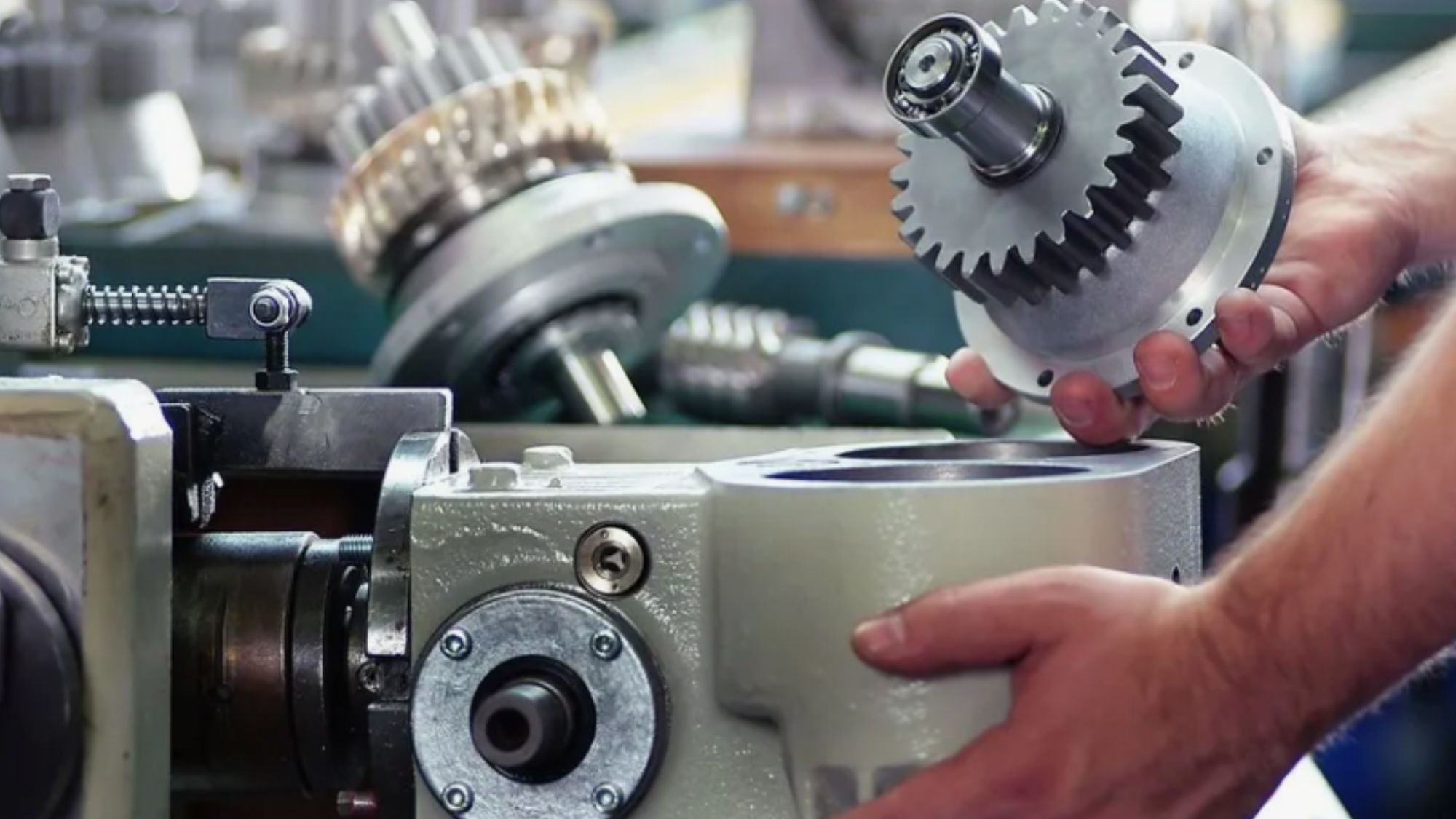 A man fixing a new Taylor freezer gear box in the machinery