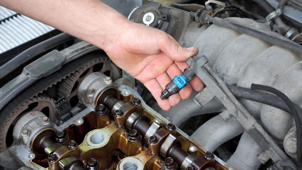 A person indicating diesel injectors problems